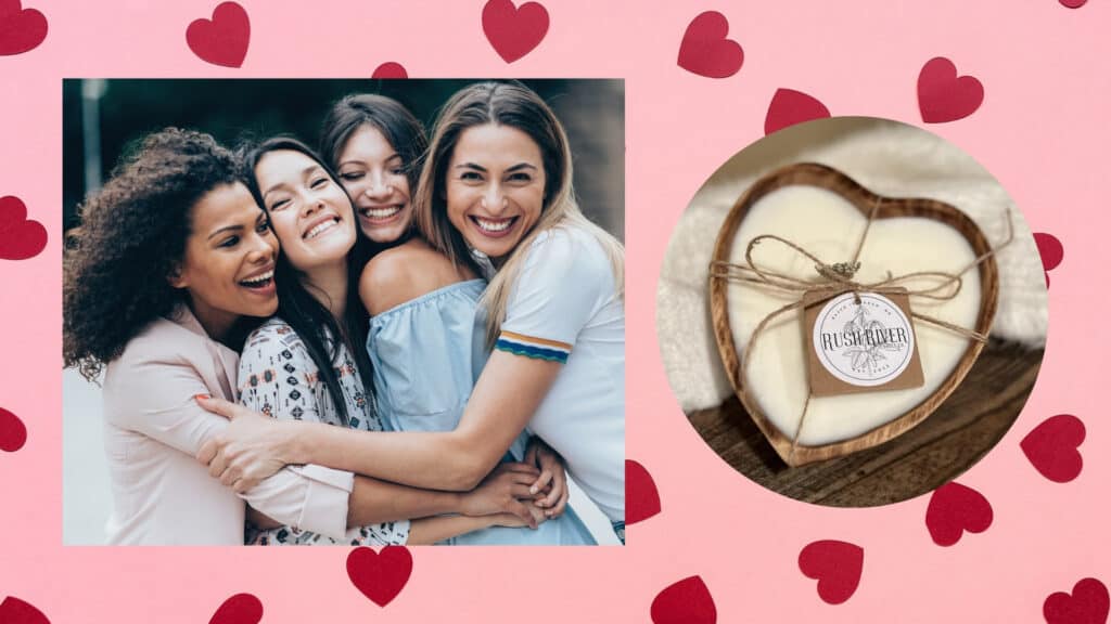 happy women in group hug displayed next to a heart candle (in a Valentine's Day card design)