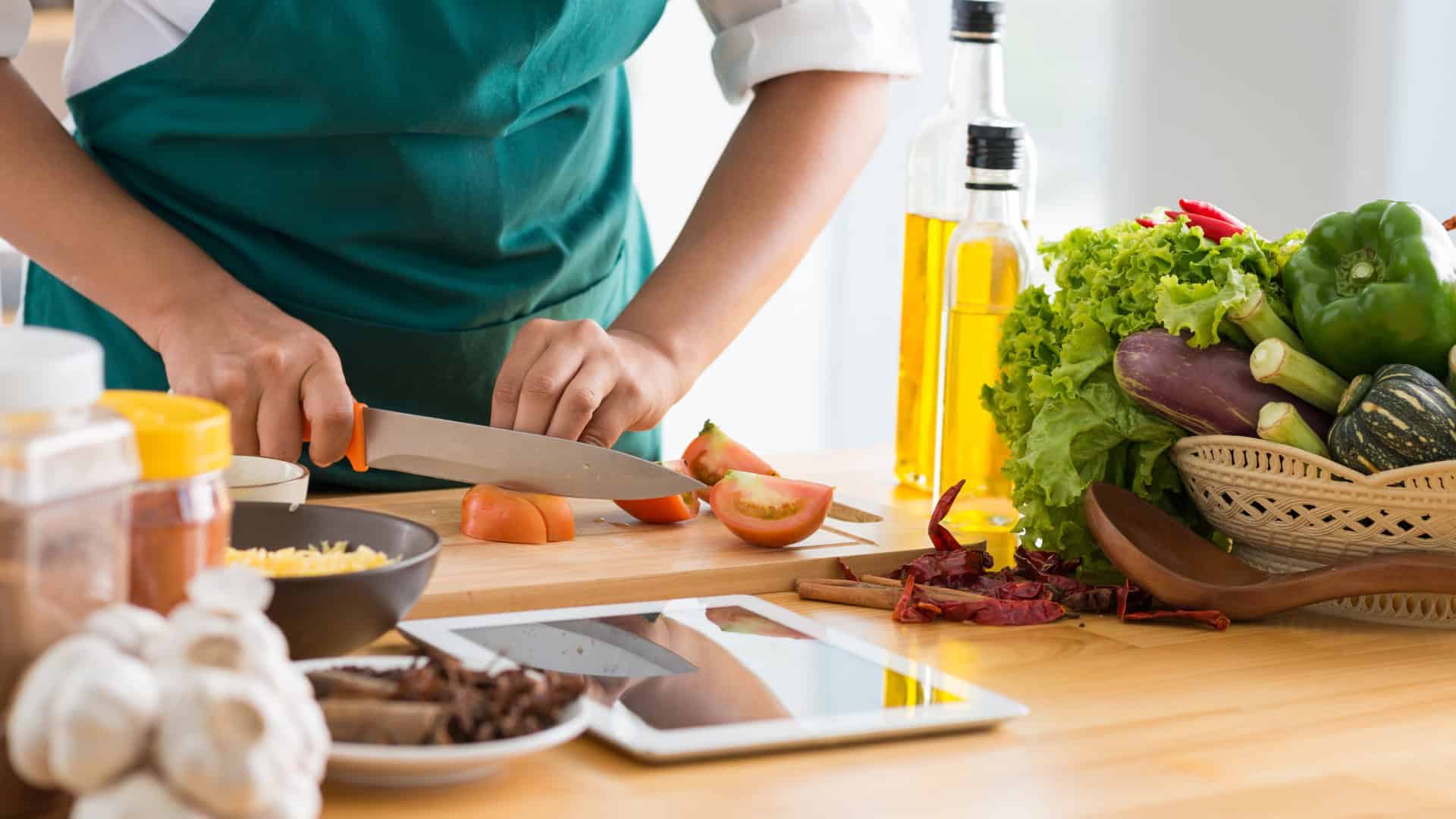 a person preparing food at a table