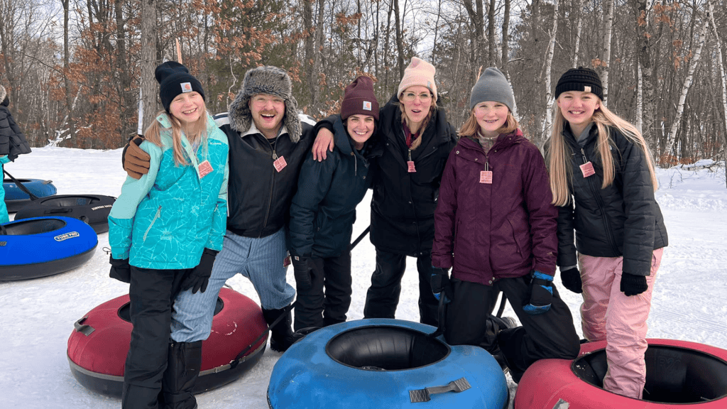 happy youth snow tubing